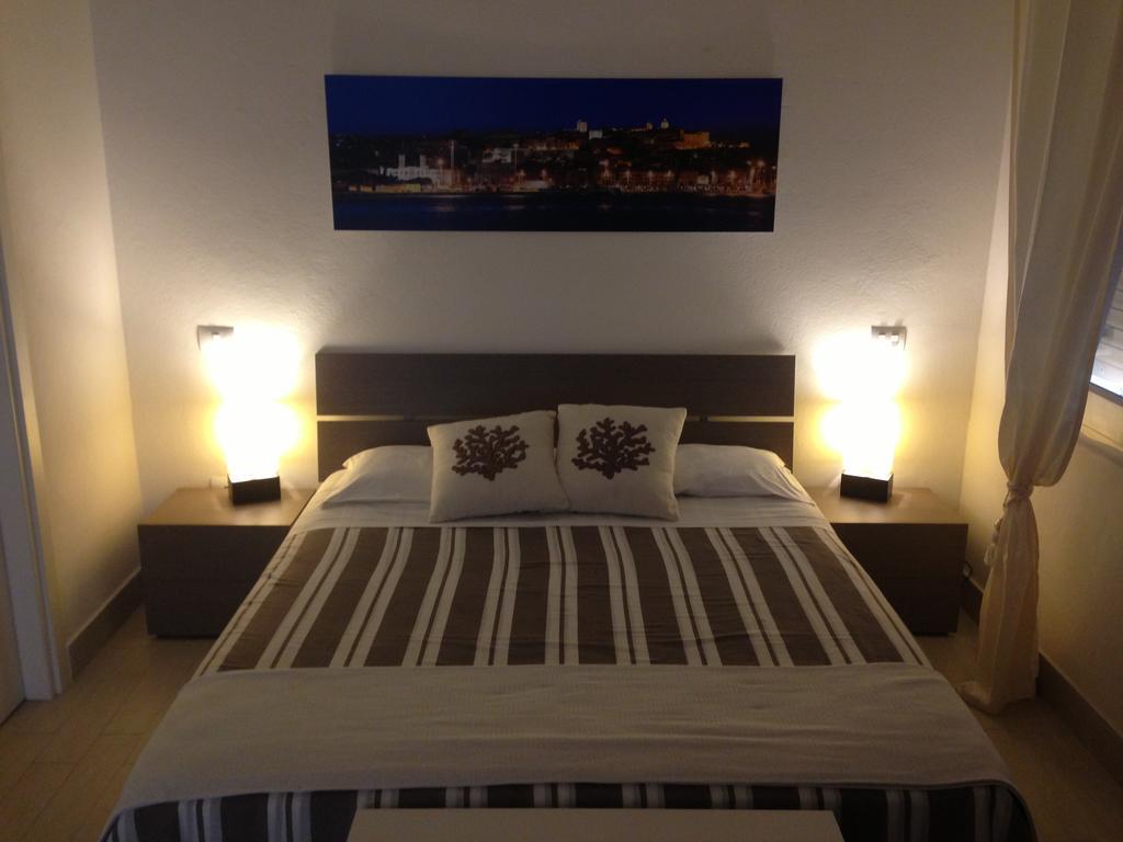 Car'Loft Beachside Κάλιαρι Δωμάτιο φωτογραφία