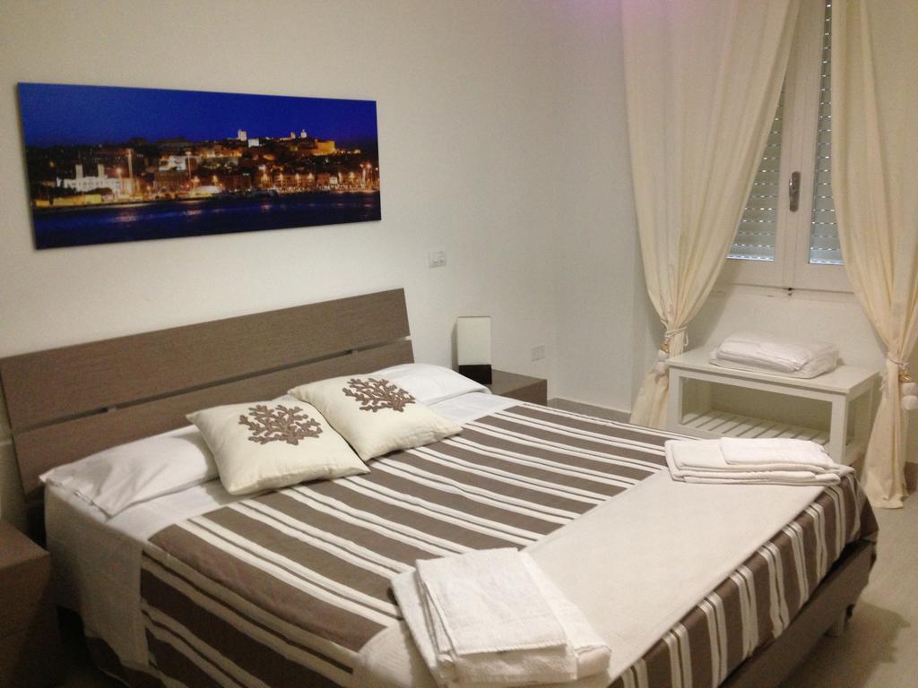 Car'Loft Beachside Κάλιαρι Δωμάτιο φωτογραφία
